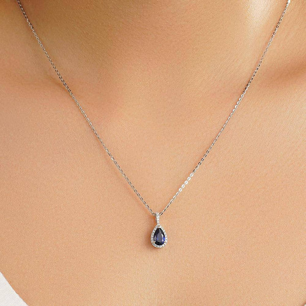 1 CT. Pear Shaped Sapphire Pendant with Pavé Diamond Halo