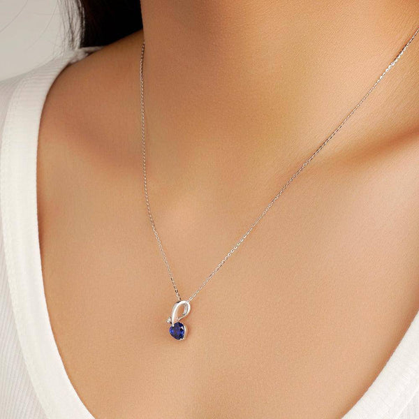1 CT. Heart Shaped Sapphire Ribbon Pendant with Diamond