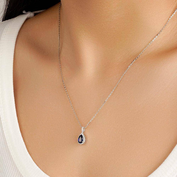 1 CT. Pear Shaped Sapphire Pendant with Pavé Diamond Halo