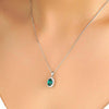 1.64 CT. Floral Halo Oval Emerald Pendant