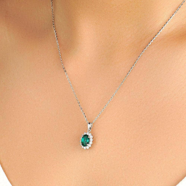 1.64 CT. Floral Halo Oval Emerald Pendant