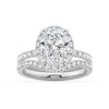 Oval Shaped Micropavé Halo Moissanite Engagement Ring With Eternity Band