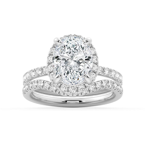 Oval Shaped Micropavé Halo Moissanite Engagement Ring With Eternity Band