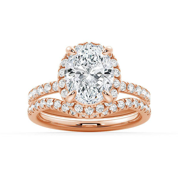 Oval Shaped Micropavé Halo Moissanite Engagement Ring With Eternity Band