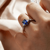 Emerald Cut Blue Sapphire and White Sapphire Three Stone Ring
