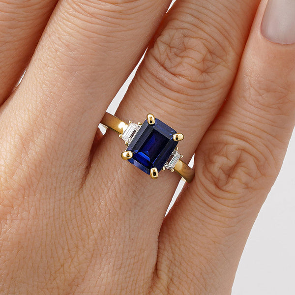 Emerald Cut Blue Sapphire and White Sapphire Three Stone Ring