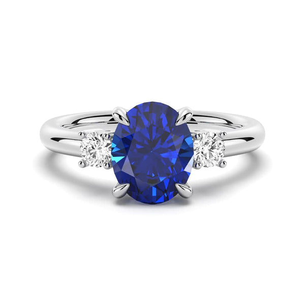 2 CT. Oval Blue Sapphire and White Sapphire Three Stone Ring