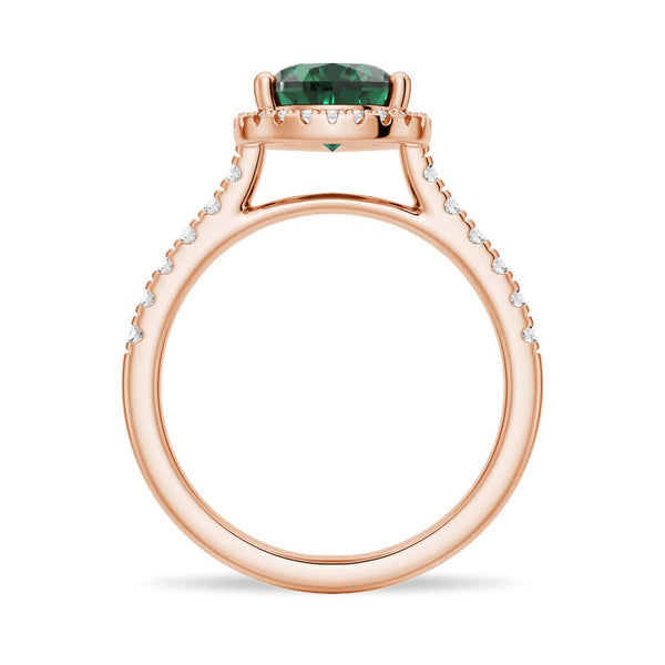 1.5 CT. Pear Shaped Emerald Ring with White Sapphire Halo Accents