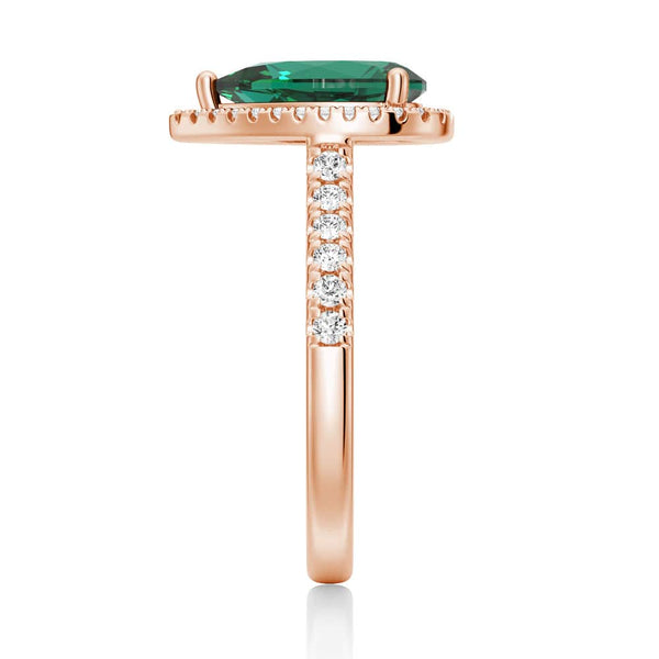 1.5 CT. Pear Shaped Emerald Ring with White Sapphire Halo Accents