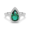 1.5 CT. Pear Shaped Emerald Ring with White Sapphire Halo Accents