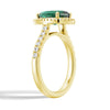 1.5 CT. Pear Shaped Emerald Ring with White Sapphire Halo Accents