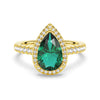 1.5 CT. Pear Shaped Emerald Ring with White Sapphire Halo Accents