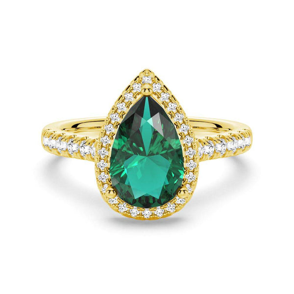 1.5 CT. Pear Shaped Emerald Ring with White Sapphire Halo Accents