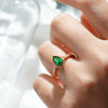 1.5 CT. Pear Shaped Emerald Ring with White Sapphire Halo Accents