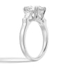 Round Cut Moissanite Engagement Ring with Tapered Baguette Side Stones