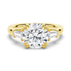 Round Cut Moissanite Engagement Ring with Tapered Baguette Side Stones