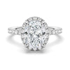 Oval Shaped Micropavé Halo Moissanite Engagement Ring With Eternity Band