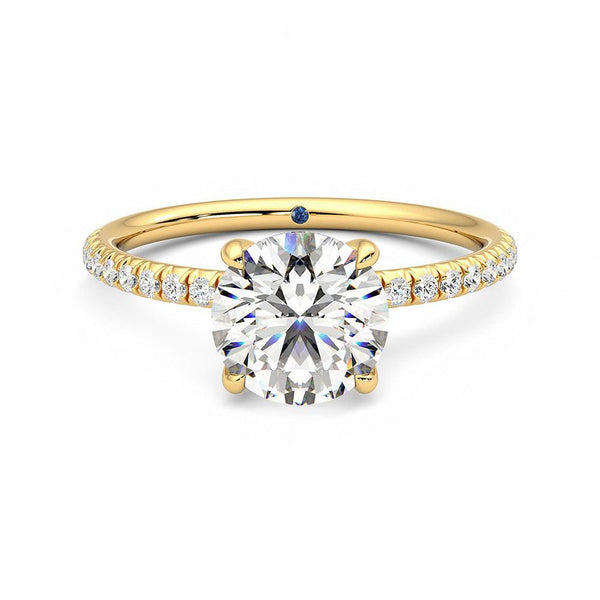 Four Prong Round Moissanite Engagement Ring with Hidden Anniversary Stone Accent