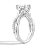 Heart Shaped Moissanite Twisted Band Engagement Ring with Hidden Accents