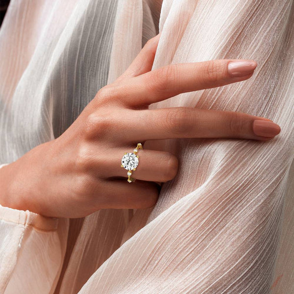 Round Cut Moissanite Ring with Diamond Spaced Band and Hidden Halo