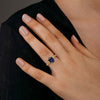 Emerald Cut Blue Sapphire and White Sapphire Three Stone Ring