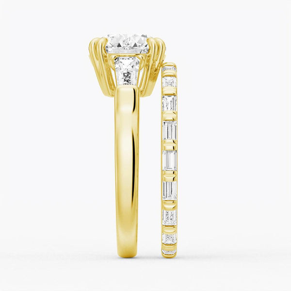 Round Cut Moissanite Engagement Ring with Tapered Baguette Side Stones