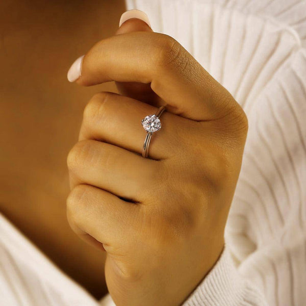 Secret Solitaire Round Moissanite Engagement Ring
