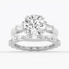 Round Cut Moissanite Engagement Ring with Tapered Baguette Side Stones