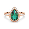 1.5 CT. Pear Shaped Emerald Ring with White Sapphire Halo Accents
