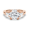 Round Cut Moissanite Engagement Ring with Tapered Baguette Side Stones