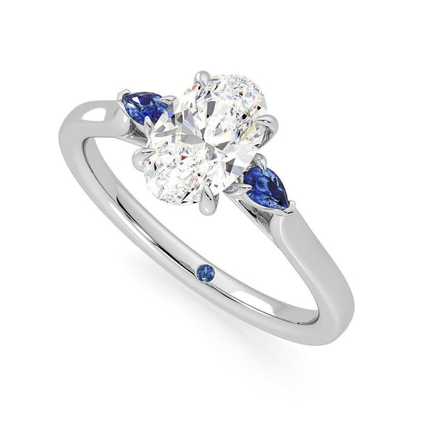Three Stone Oval Cut Moissanite and Sapphire Engagement Ring with Hidden Anniversary Stone Accent
