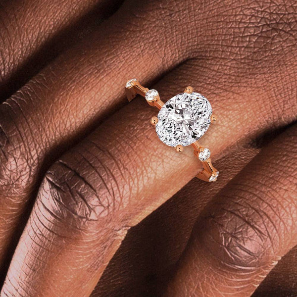 Oval Cut Moissanite Ring with Diamond Spaced Band and Hidden Halo